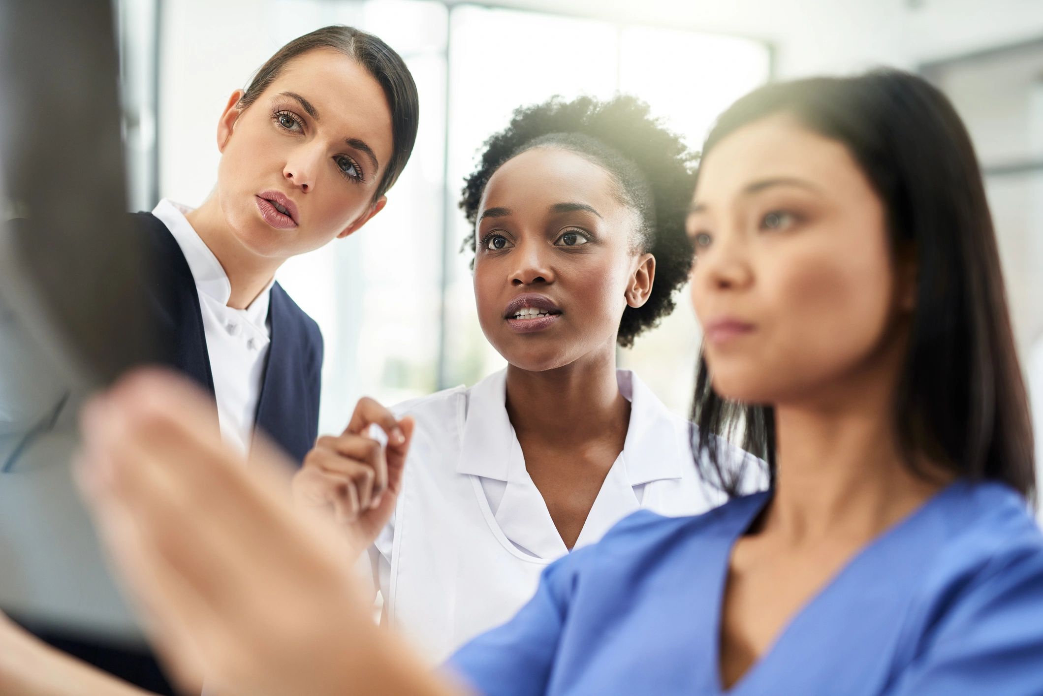 Medical professionals reviewing an x-ray together